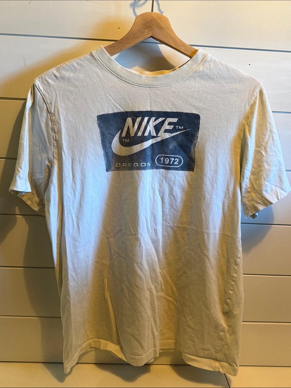 Nike Off-White Short-Sleeve Graphic Logo Tee with Navy Print